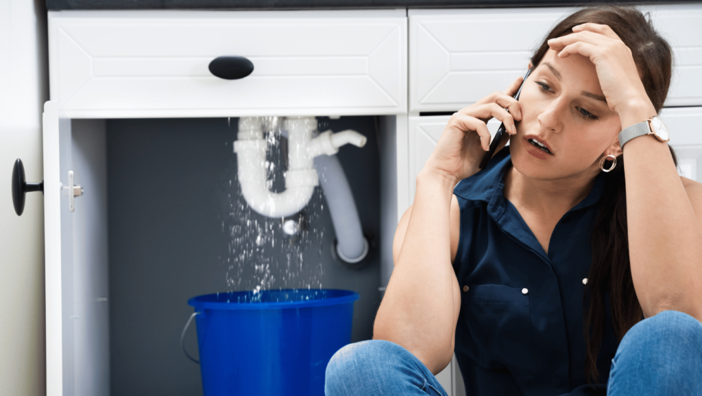 a women with plumbing problems call local plumbers for help